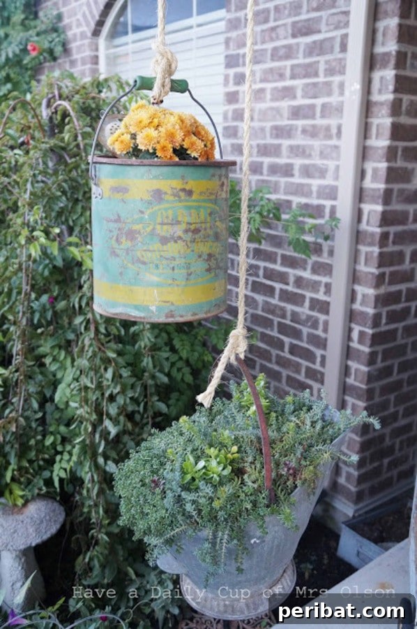 Elevate Your Outdoors with DIY Hanging Accents 14 Galvanized bucket planter
