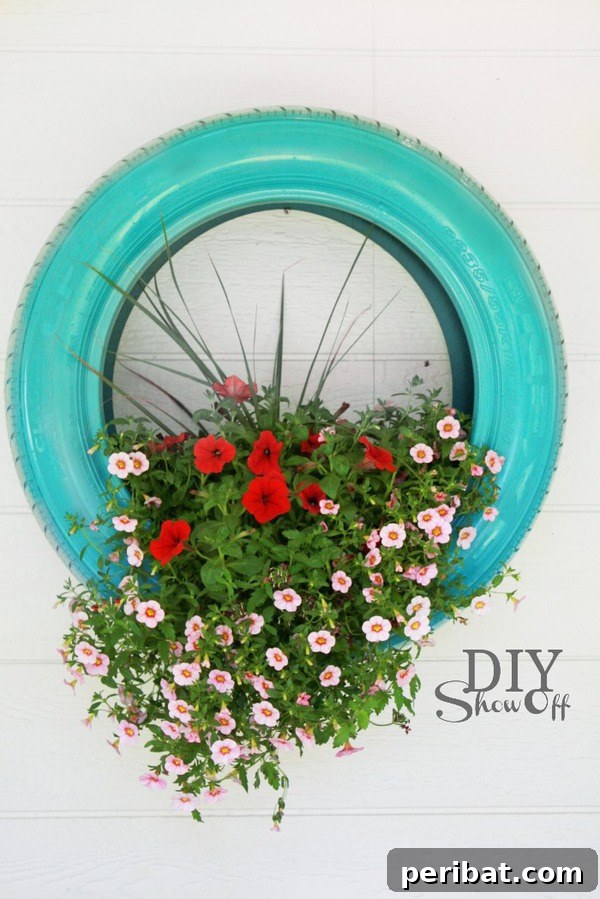 Elevate Your Outdoors with DIY Hanging Accents 20 Teal tire planter