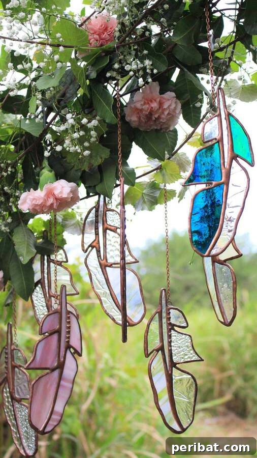Elevate Your Outdoors with DIY Hanging Accents 23 Stained glass feathers