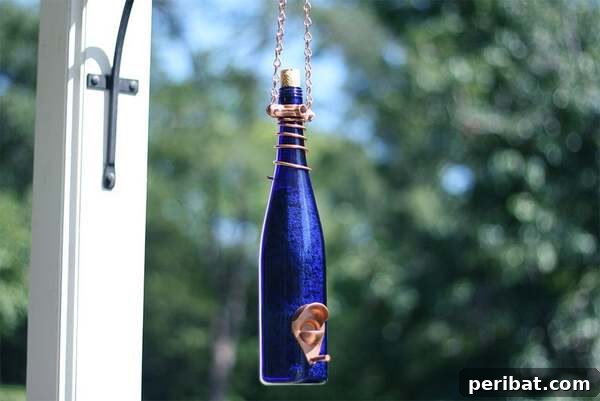 Elevate Your Outdoors with DIY Hanging Accents 9 Bottle bird feeder