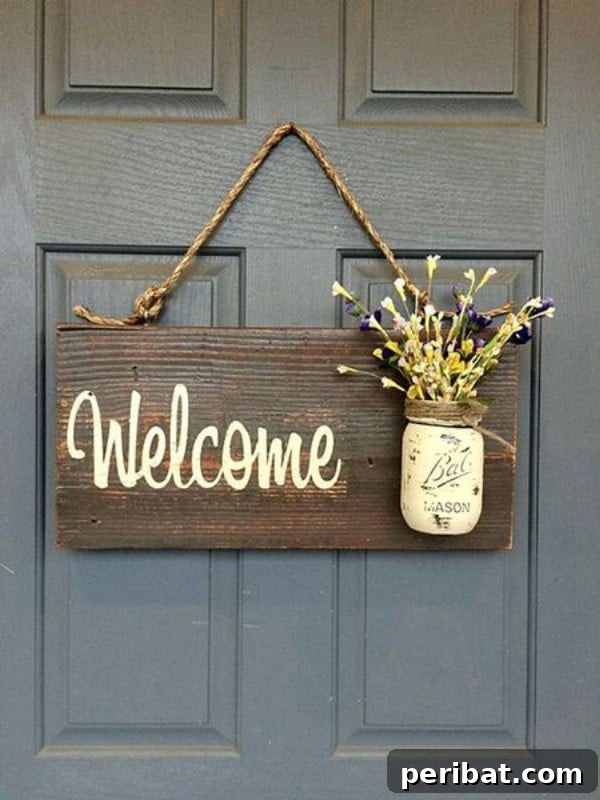 Rustic wooden welcome sign with a mason jar planter