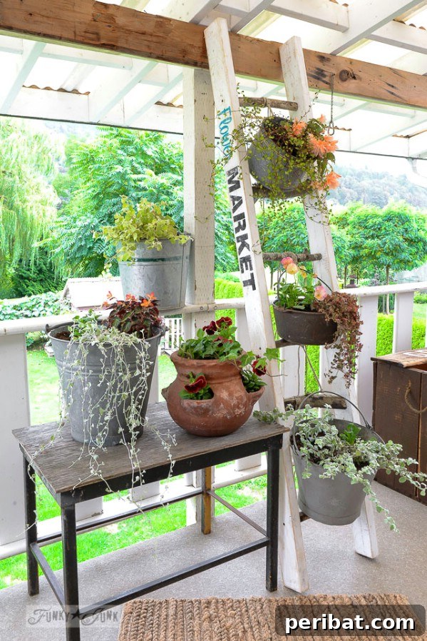 Assorted buckets and pots on a weathered vintage ladder