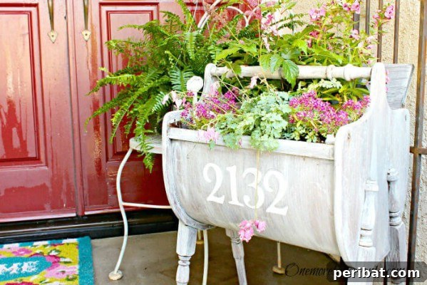White wooden magazine rack with house numbers, used as a planter