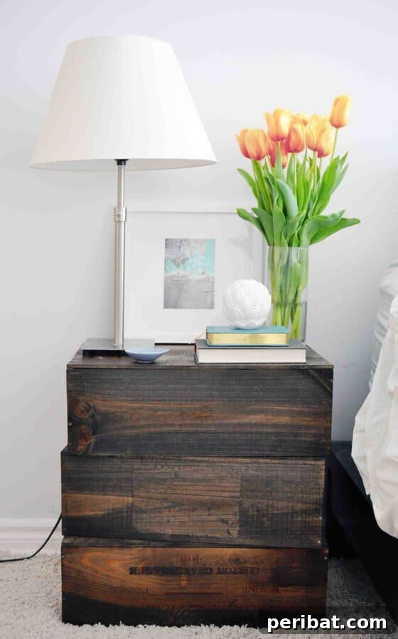 Creating Your Rustic Bedroom Oasis 17 Dark stained wood crate end table as nightstand