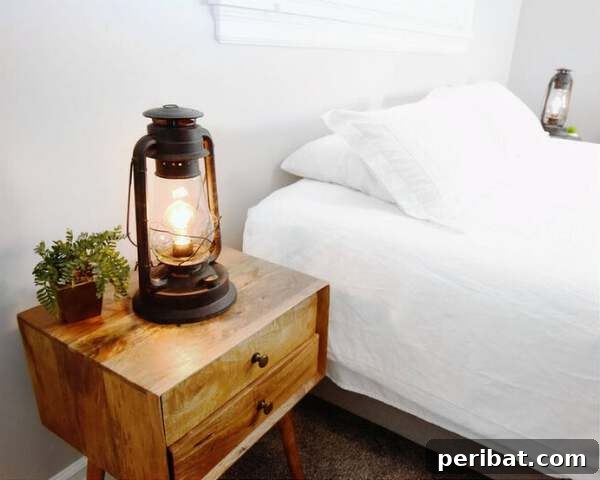 Creating Your Rustic Bedroom Oasis 18 Electric vintage lantern by a white bed
