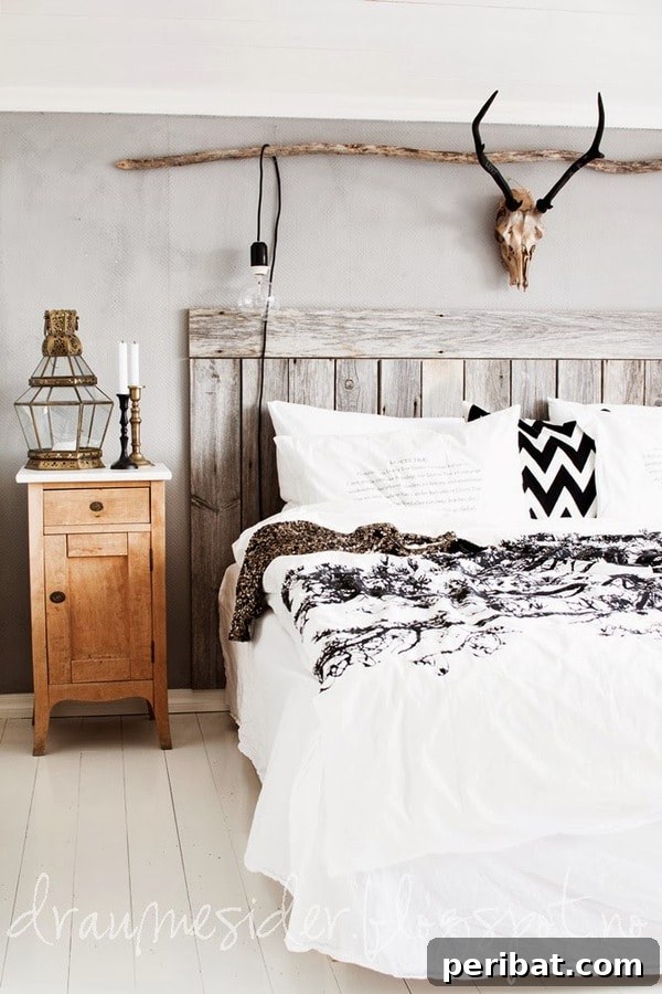 Creating Your Rustic Bedroom Oasis 22 White and black bedding with rustic wood and natural elements