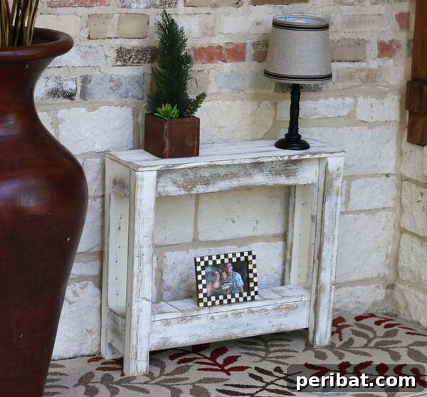 Creating Your Rustic Bedroom Oasis 31 White weathered table with lamp against a brick wall