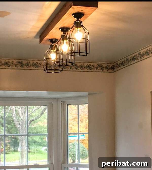 Creating Your Rustic Bedroom Oasis 39 Rustic farmhouse beam light fixtures