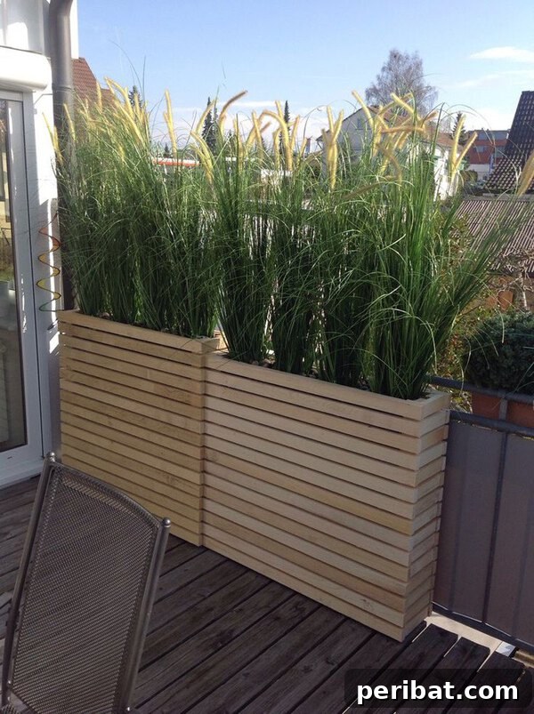 Smart DIY Integrated Planters for Maximizing Tiny Outdoor Areas 14 Tall wooden slat planters filled with ornamental grasses, creating a contemporary look.