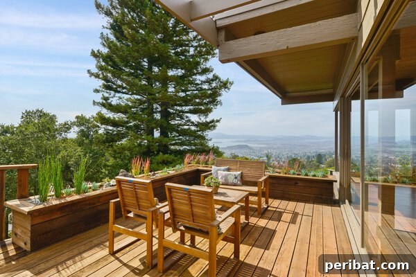 Smart DIY Integrated Planters for Maximizing Tiny Outdoor Areas 15 Deep wooden planters replacing a traditional porch railing, creating a continuous green barrier.