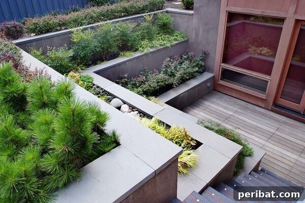 Smart DIY Integrated Planters for Maximizing Tiny Outdoor Areas 19 Tiered concrete planters integrated into a sloped backyard, creating a multi-level garden.