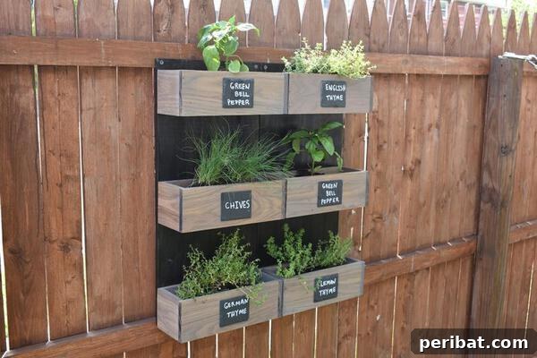 Smart DIY Integrated Planters for Maximizing Tiny Outdoor Areas 23 A wall-mounted vertical herb garden made of individual planter boxes with chalkboard labels.