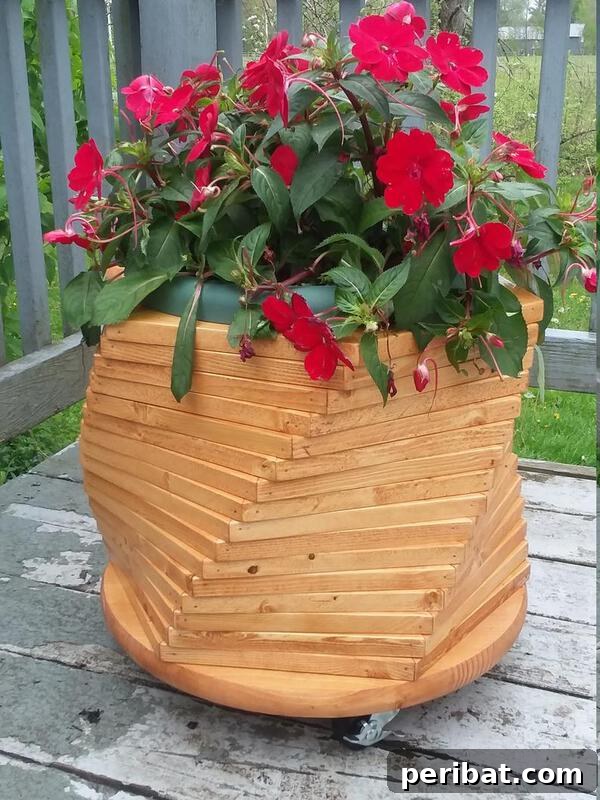 Smart DIY Integrated Planters for Maximizing Tiny Outdoor Areas 29 A unique hexagon-shaped planter integrated into a wooden deck.