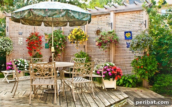 Smart DIY Integrated Planters for Maximizing Tiny Outdoor Areas 30 A garden wall adorned with hanging baskets and integrated bottom planters, creating a living wall effect.
