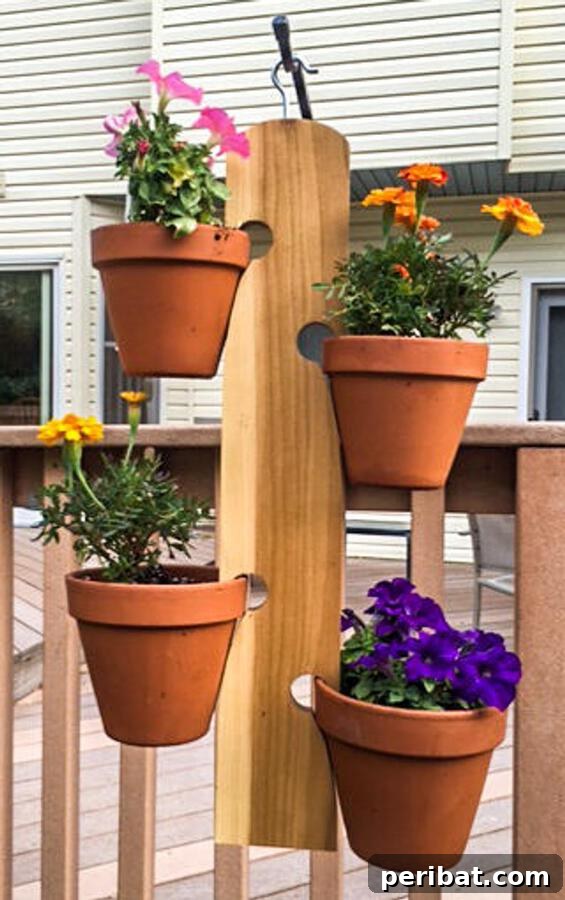 Smart DIY Integrated Planters for Maximizing Tiny Outdoor Areas 9 A wooden wall-mounted hanger designed to hold terra cotta pots securely.