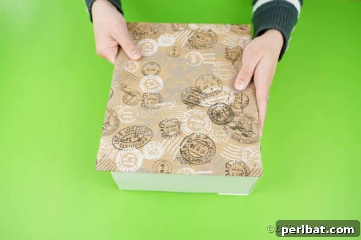 Woman holding covered box