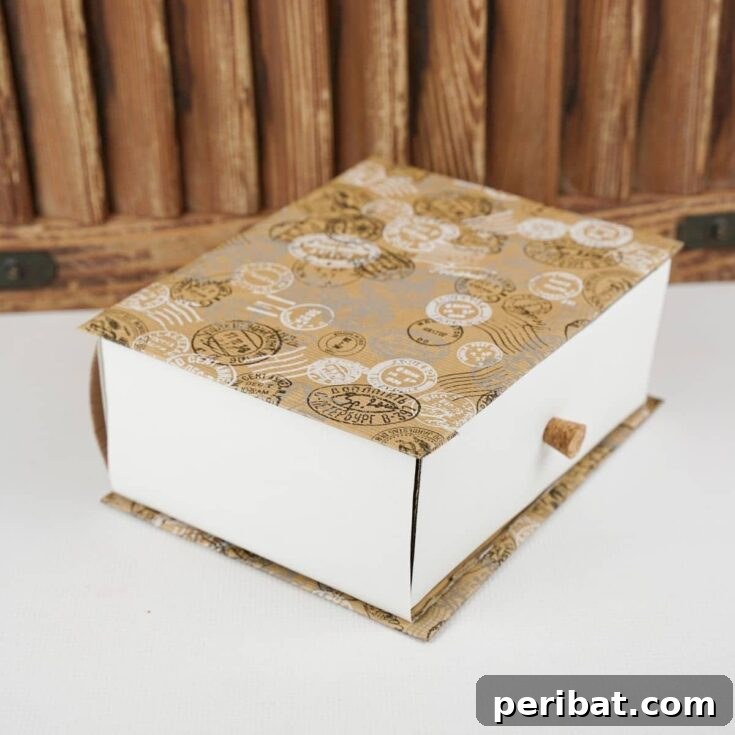 Box drawer in front of wood background