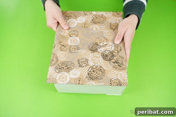 Woman holding covered box