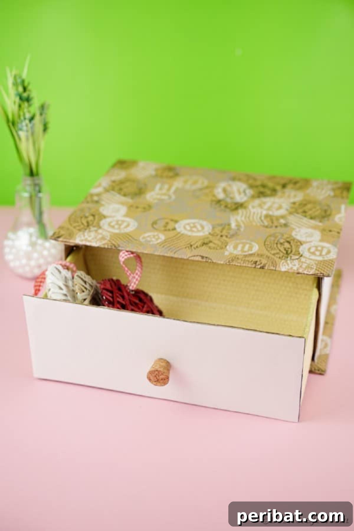 Box drawer open with flowers beside
