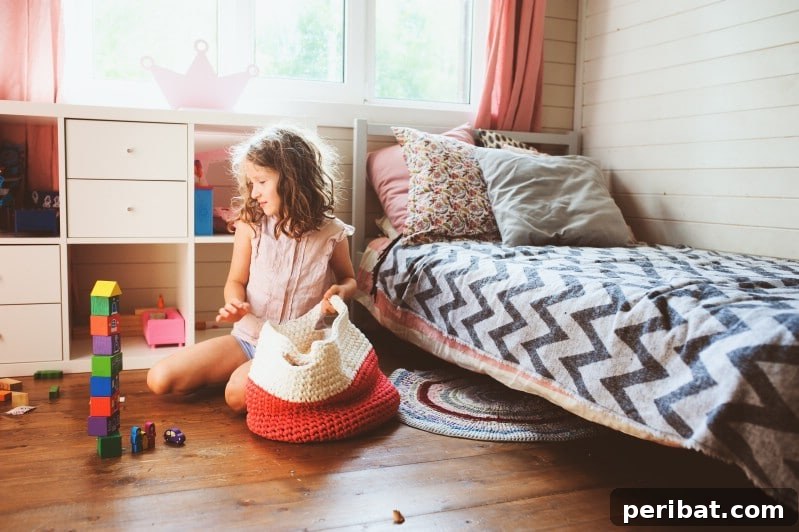 Little girl organizing her toys.