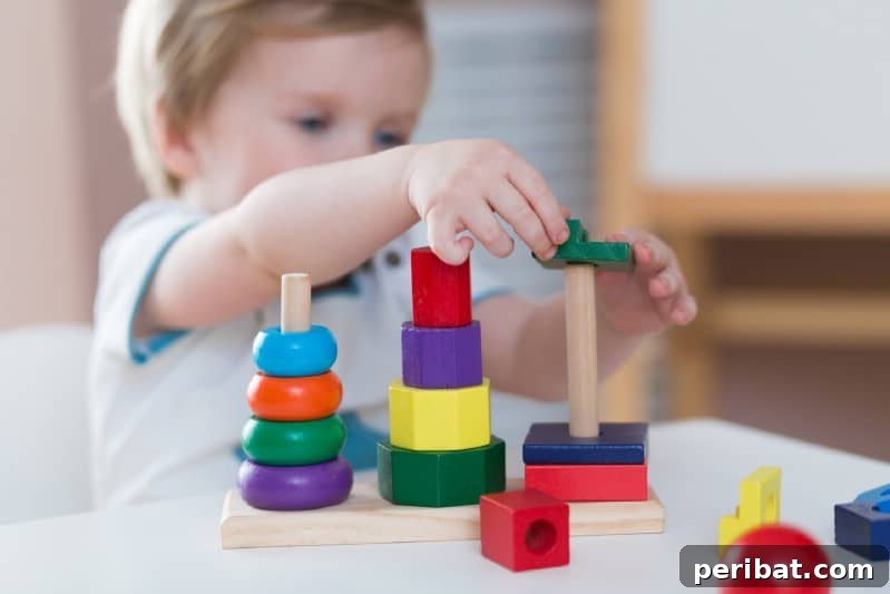 Toddler improving fine motor skills.