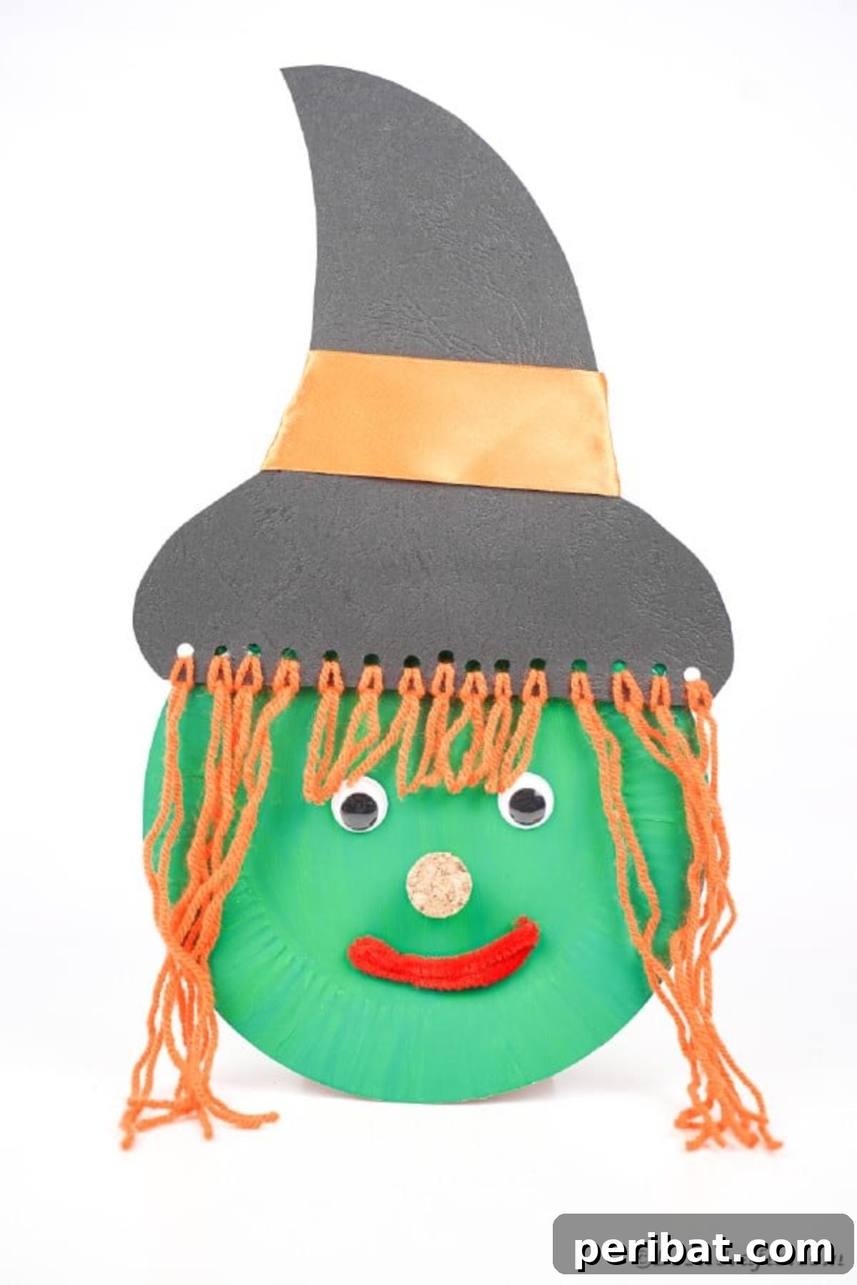 Spooktacular Paper Plate Witch Craft 31 Paper plate witch against a plain white background