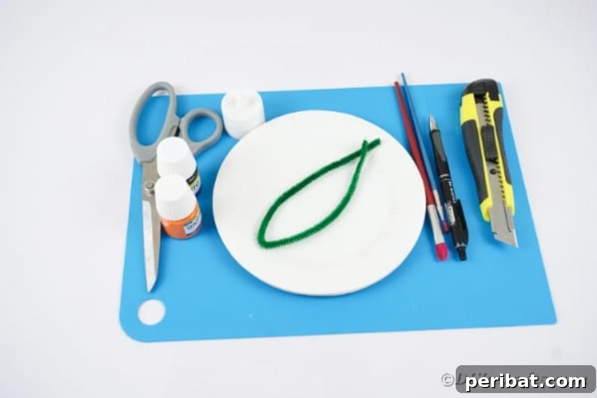 Grinning Gourd Lanterns: A Paper Plate Craft for Kids 7 Various supplies laid out for making a paper plate pumpkin