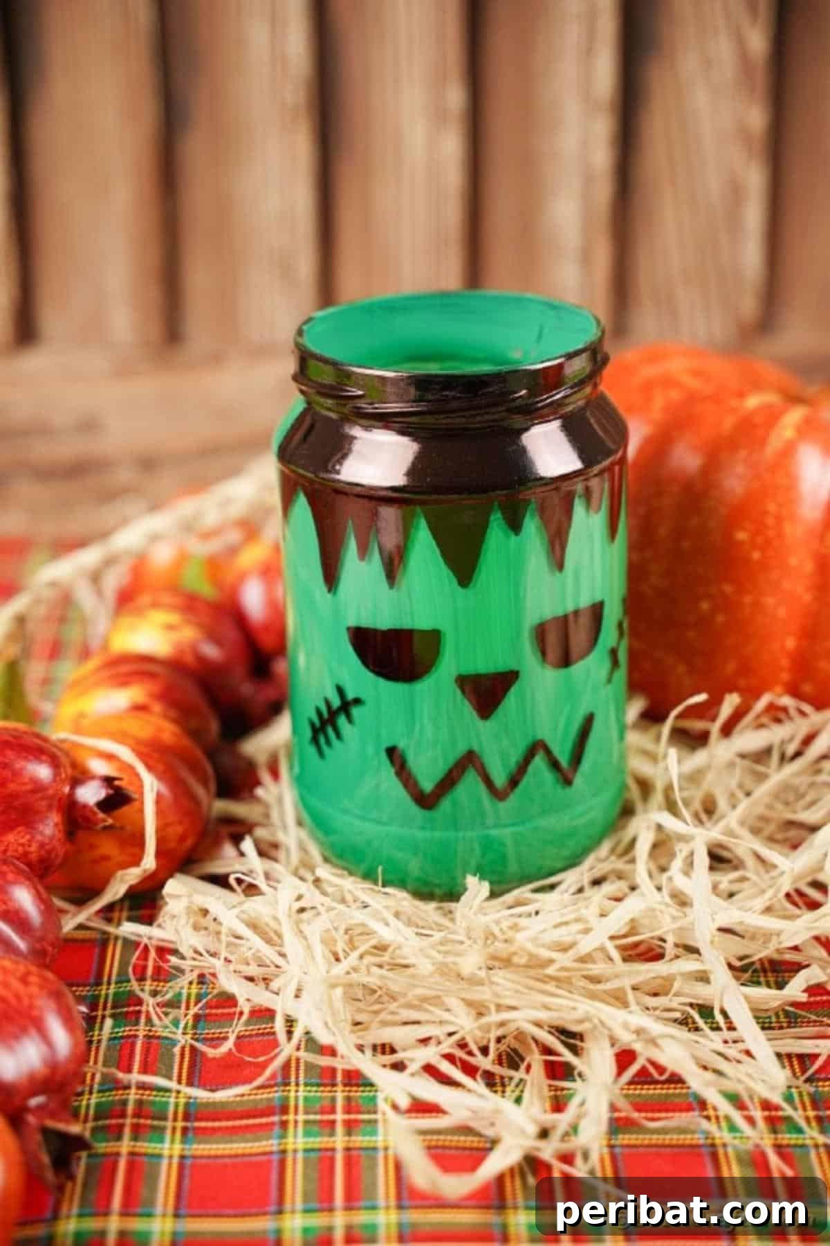 Charming Frankenstein Mason Jar Halloween Glow 14 Mason jar frankenstein on hay by pumpkins