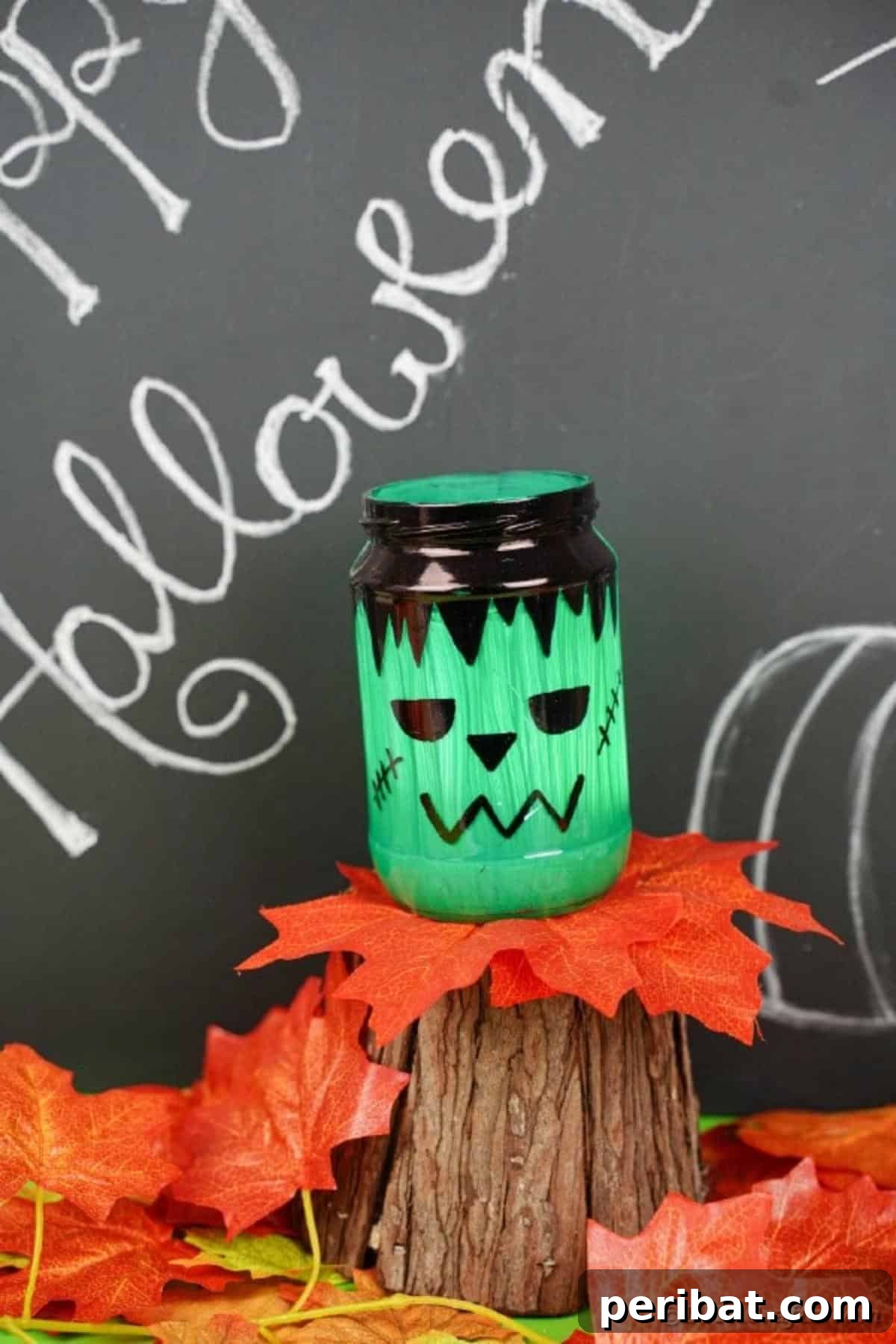 Charming Frankenstein Mason Jar Halloween Glow 17 Mason jar lantern lit in front of chalkboard