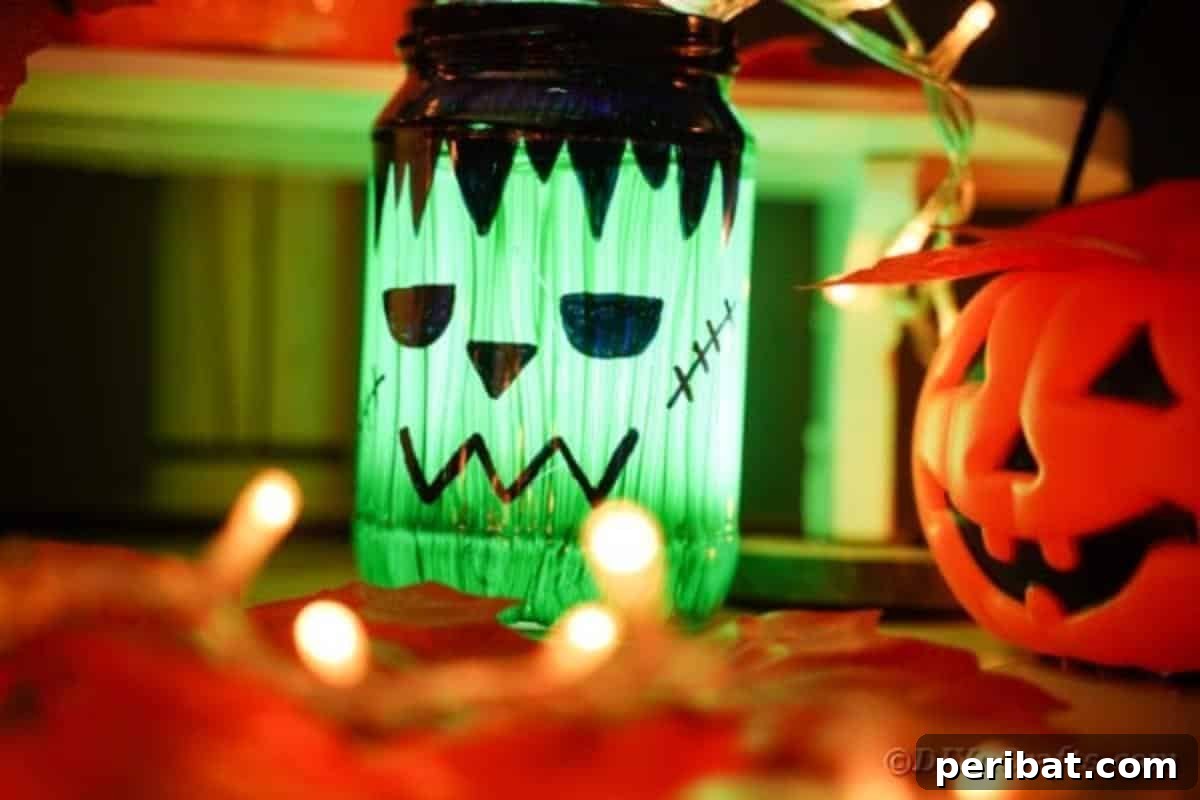 Charming Frankenstein Mason Jar Halloween Glow 4 Frankenstien lantern lit by fake flowers