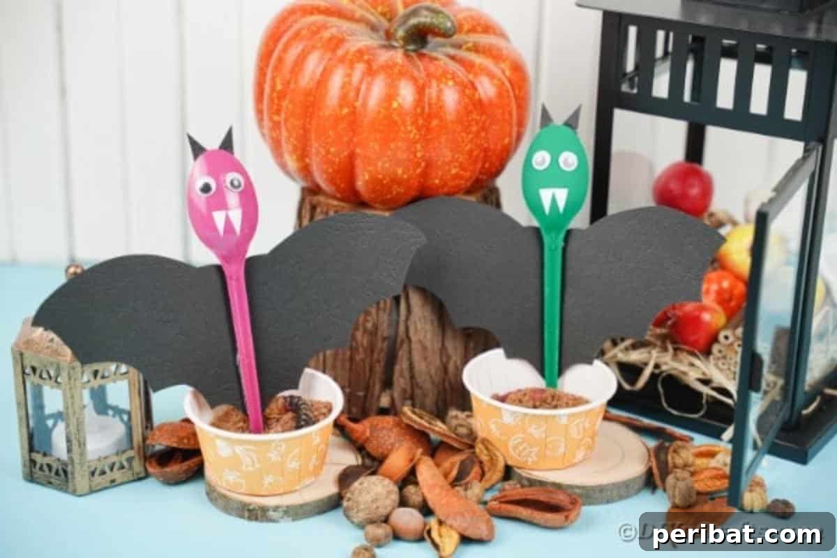 Adorable Recycled Plastic Spoon Bat Halloween Decor 5 Several finished upcycled spoon bats creatively displayed amongst other Halloween decorations, showcasing their versatility as festive accents in a home setting.