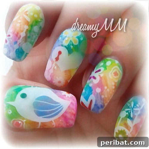 Charming Rainbow Bird Nail Art with Watercolor Background