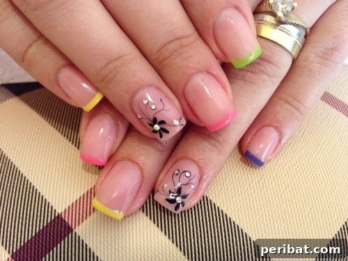 Refined Subtle Spring Nail Art with Colored Tips and Bling