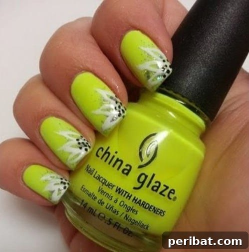 Statement Bright and Bold Flower Nail Art with Glitter