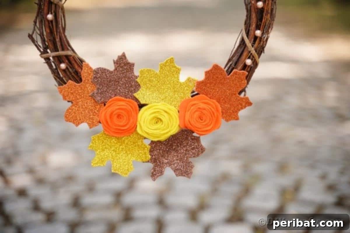 Autumn Grapevine Wreath with Soft Fabric Blooms 5 Fall wreath with flowers hanging in tree