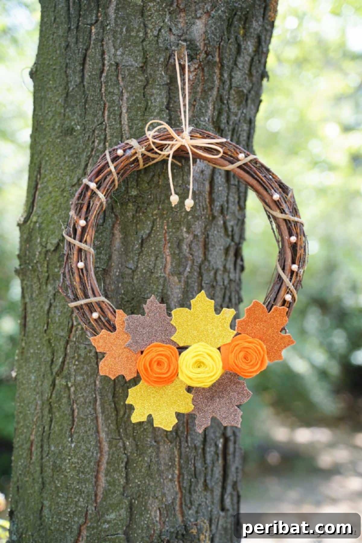 Autumn Grapevine Wreath with Soft Fabric Blooms 25 Fall wreath with flowers hanging in tree