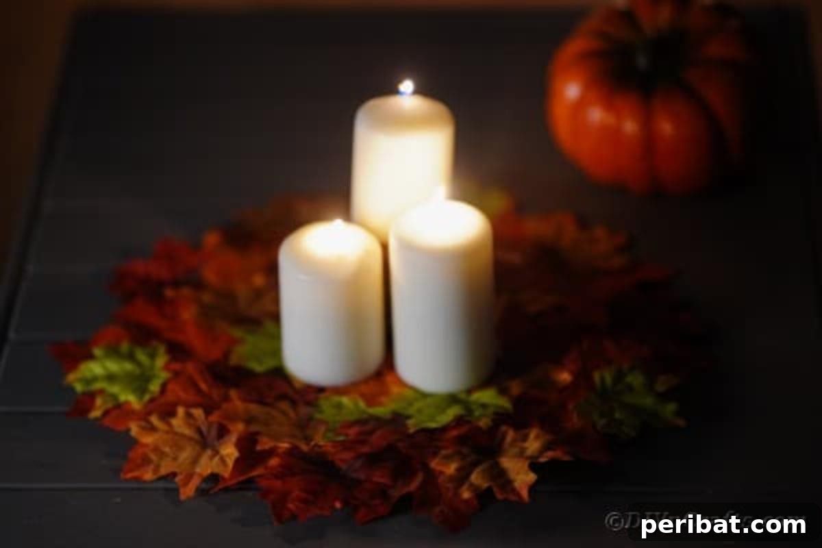 Finished fall leaf placemat serving as a cozy base for lit candles, enhancing autumn ambiance