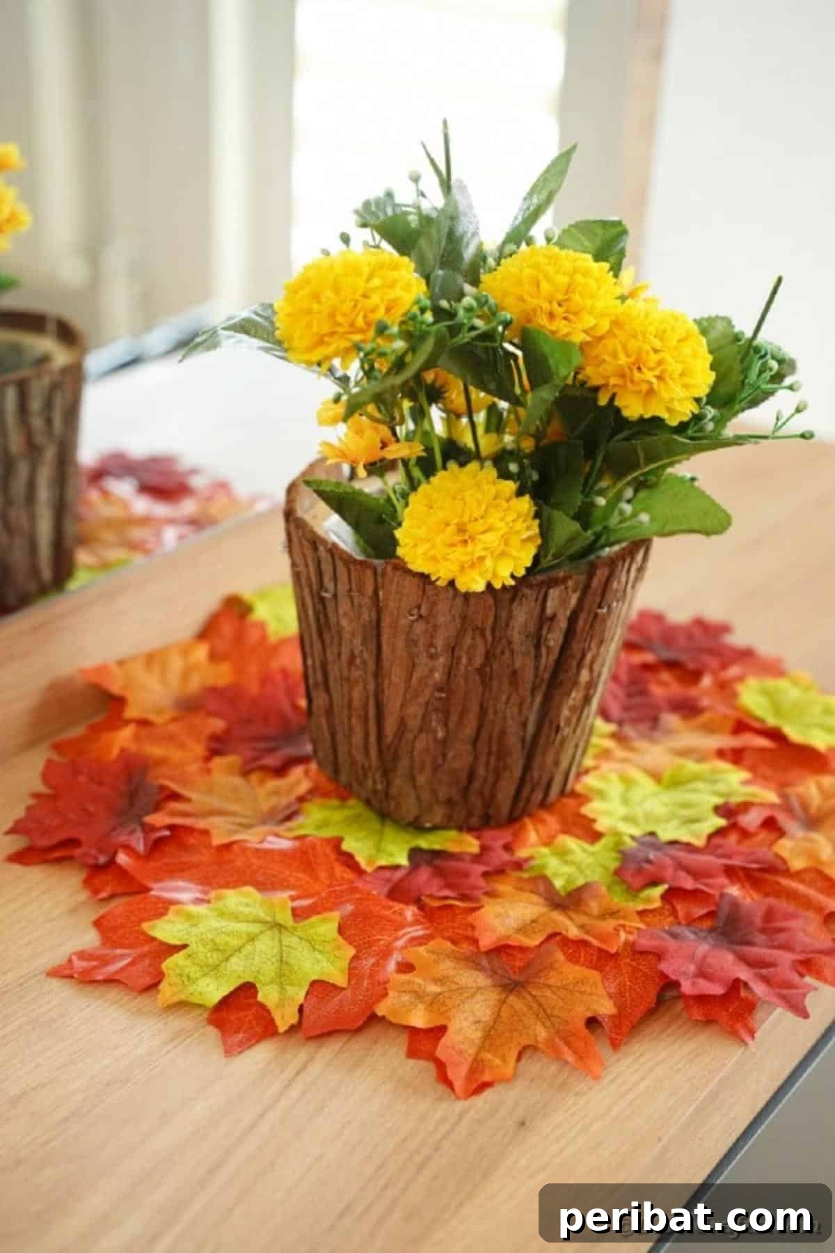 A charming stump flower pot positioned on the fall leaf placemat, perfect for rustic decor