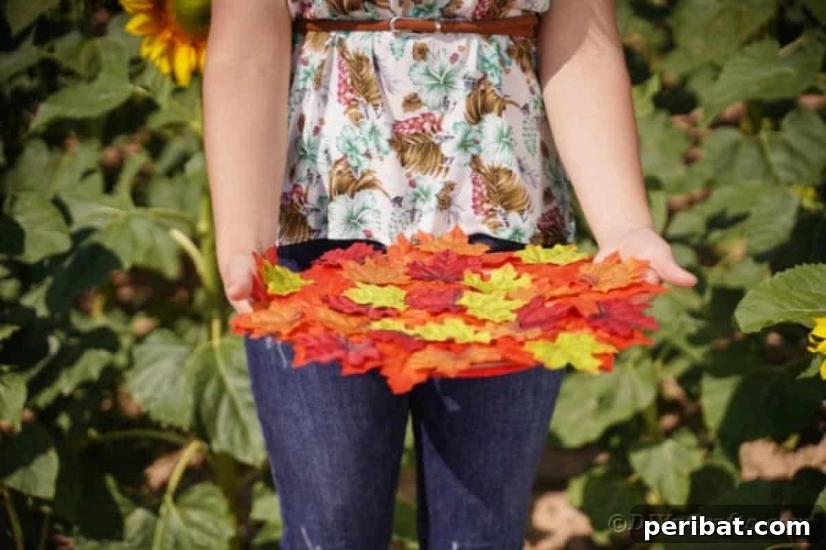 Person holding a large, beautifully crafted fall leaf placemat showcasing its size and rustic texture