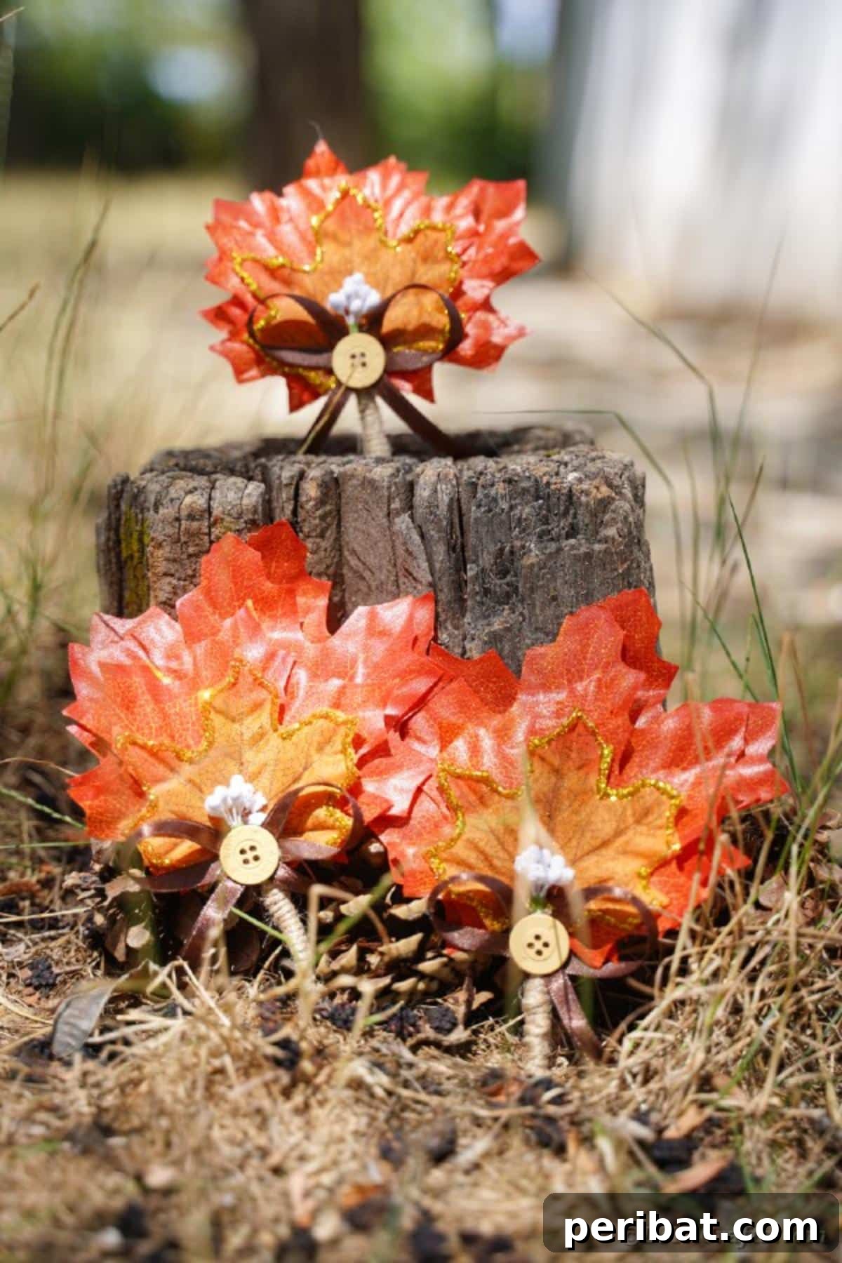 Elegant Autumnal Foliage Wedding Boutonnière 19 A cluster of artfully arranged fall leaf boutonnieres on a rustic tree stump, illustrating their potential as versatile autumn wedding decor or seasonal home accents.