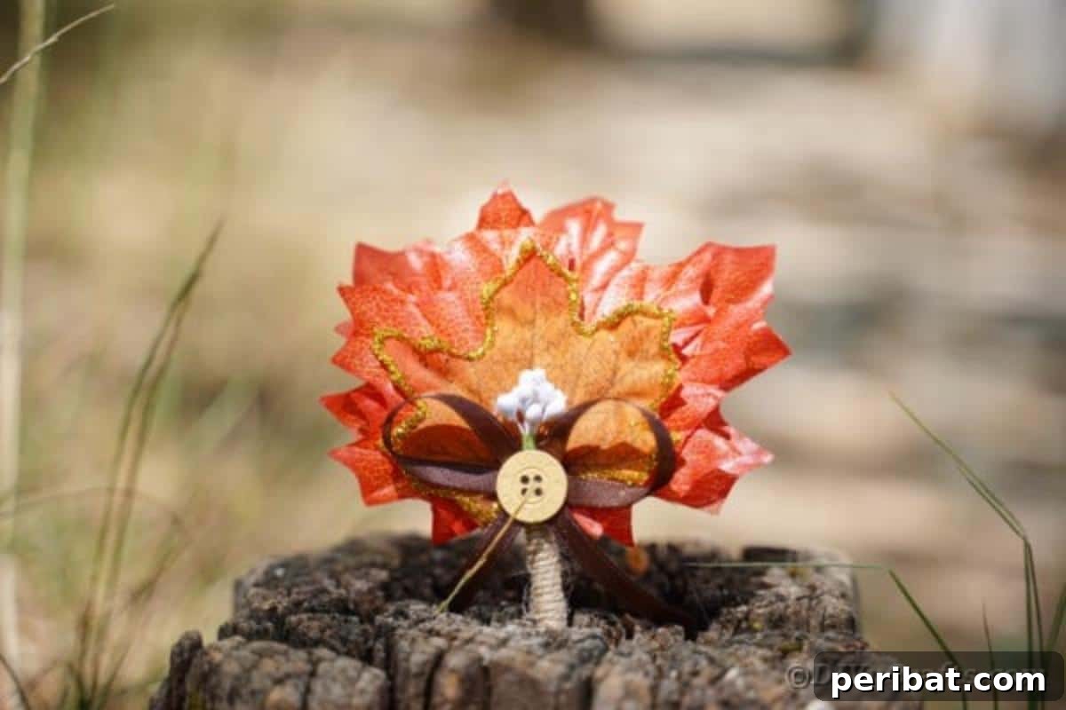 Elegant Autumnal Foliage Wedding Boutonnière 5 Four beautifully arranged fall leaf boutonnieres displayed on a tree stump, showing subtle variations in color and design.
