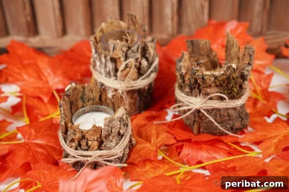 Woodland Hearth Bark Lantern 7 A single tree bark lantern resting on a bed of artificial autumn leaves, creating a cozy display