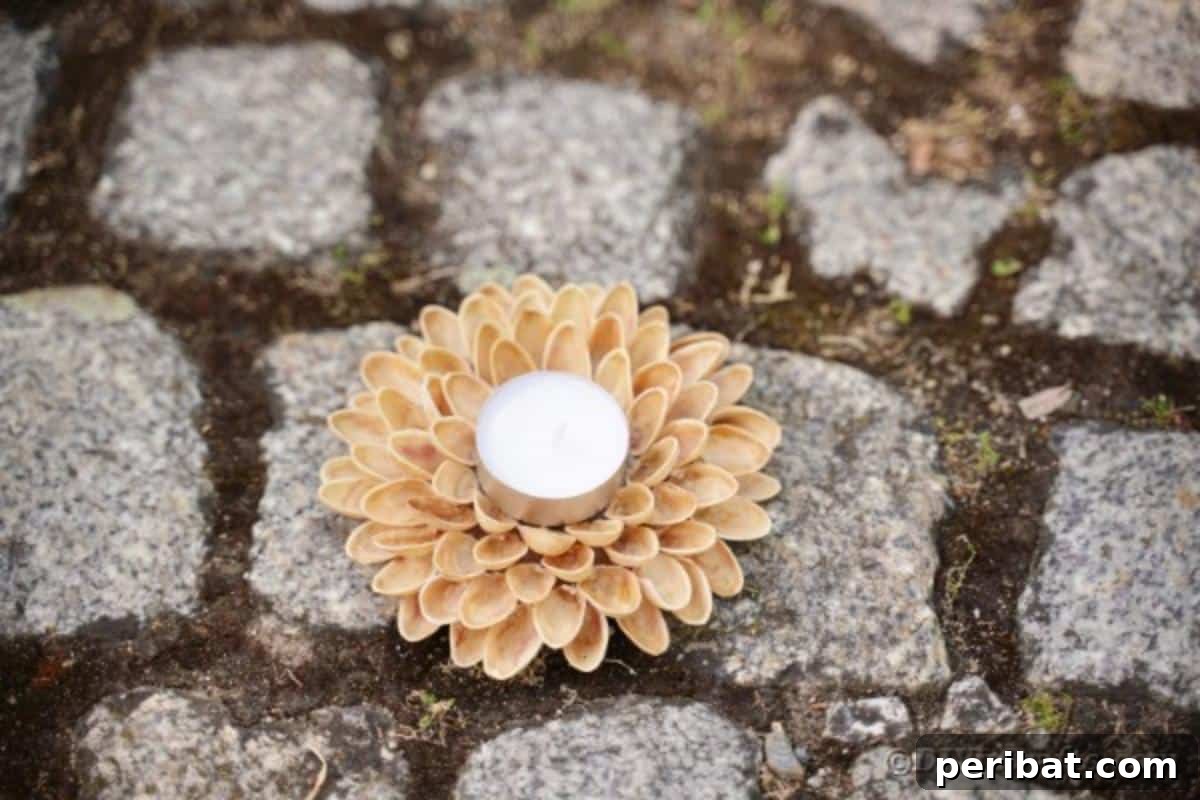 Artisanal Pistachio Shell Candle Holder 7 Pistachio candle holder placed on an outdoor cobblestone surface