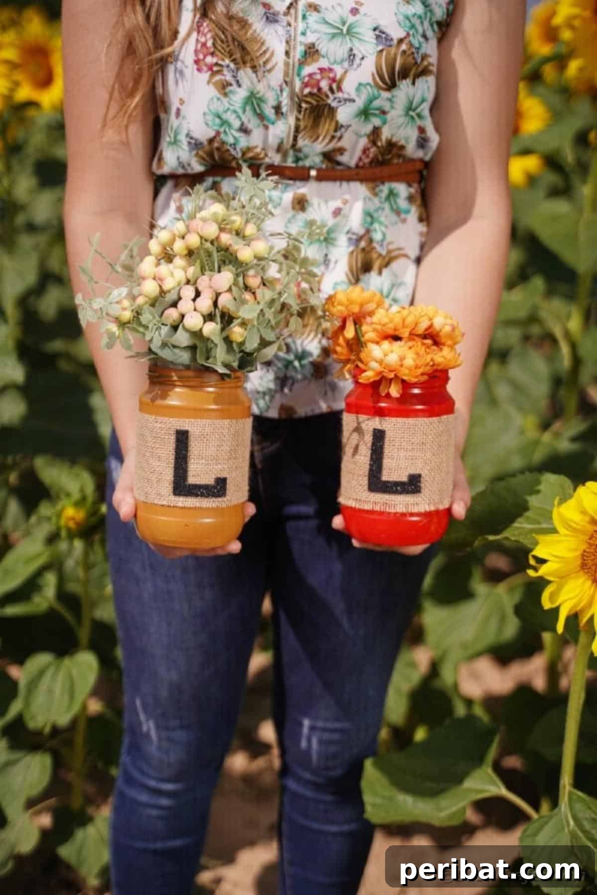 Cozy Farmhouse Fall Lettered Jars 27 Close-up of a woman holding two fall lettered jars with additional decorative elements