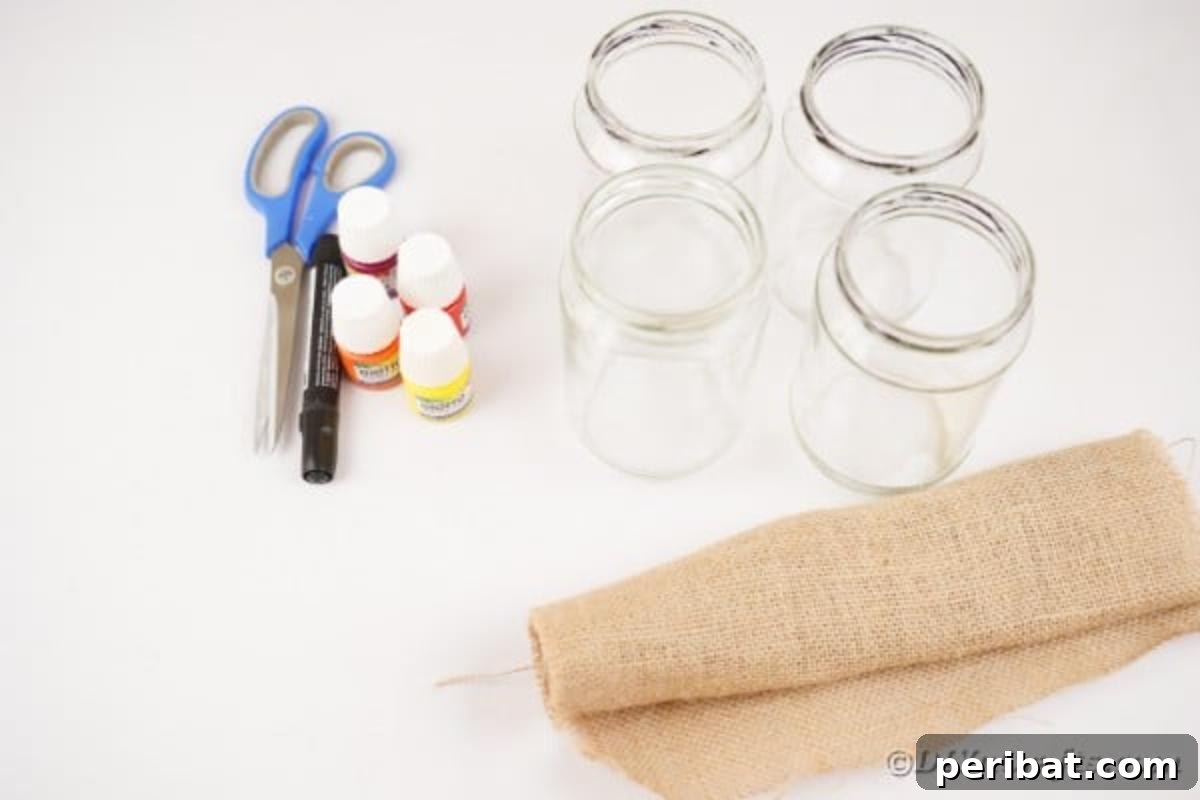 Cozy Farmhouse Fall Lettered Jars 9 A collection of supplies for making fall sign mason jar decor, including paints, jars, and foam paper