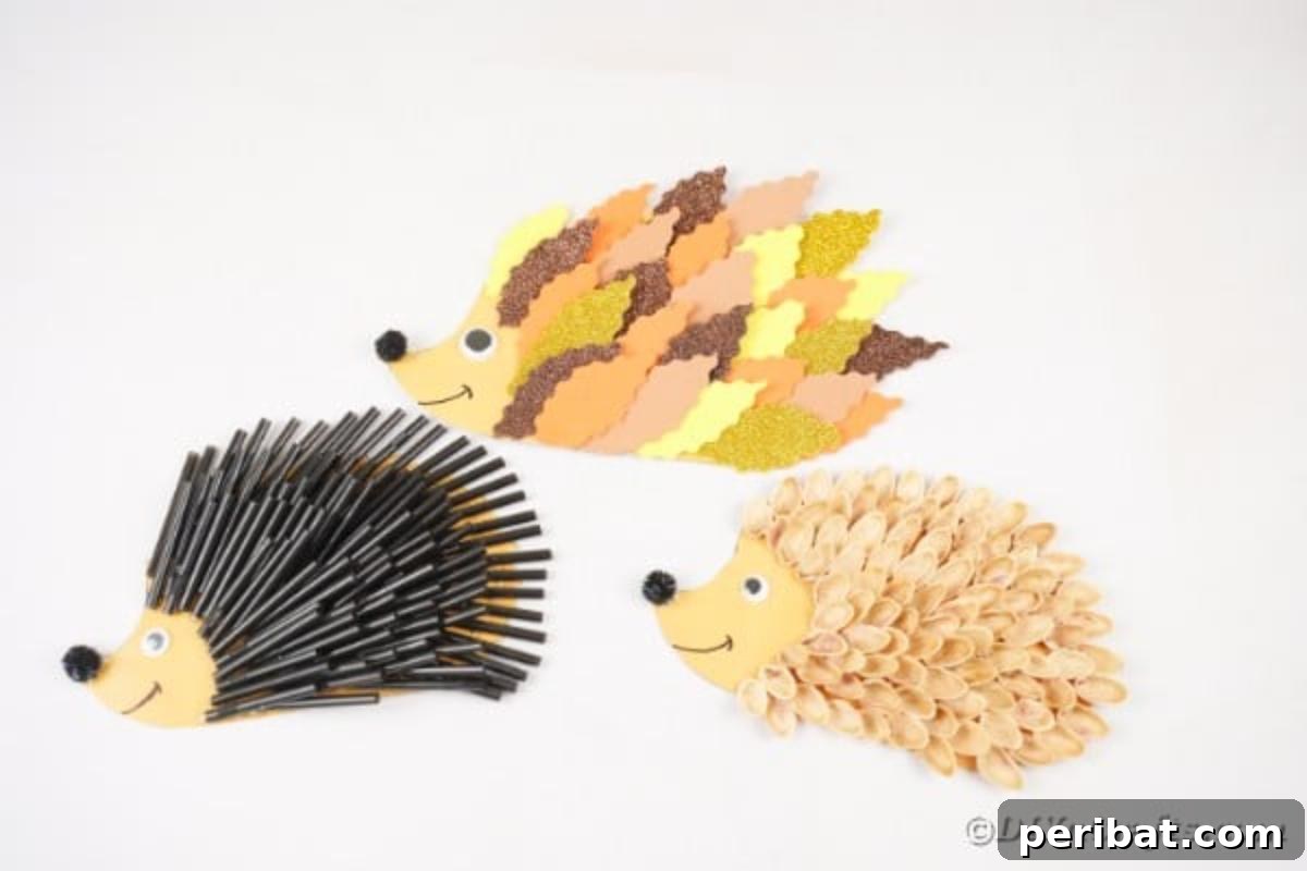 Three different hedgehog crafts (pistachio shell, black straw, paper leaf) displayed together on a white table, showcasing the variety of textures.