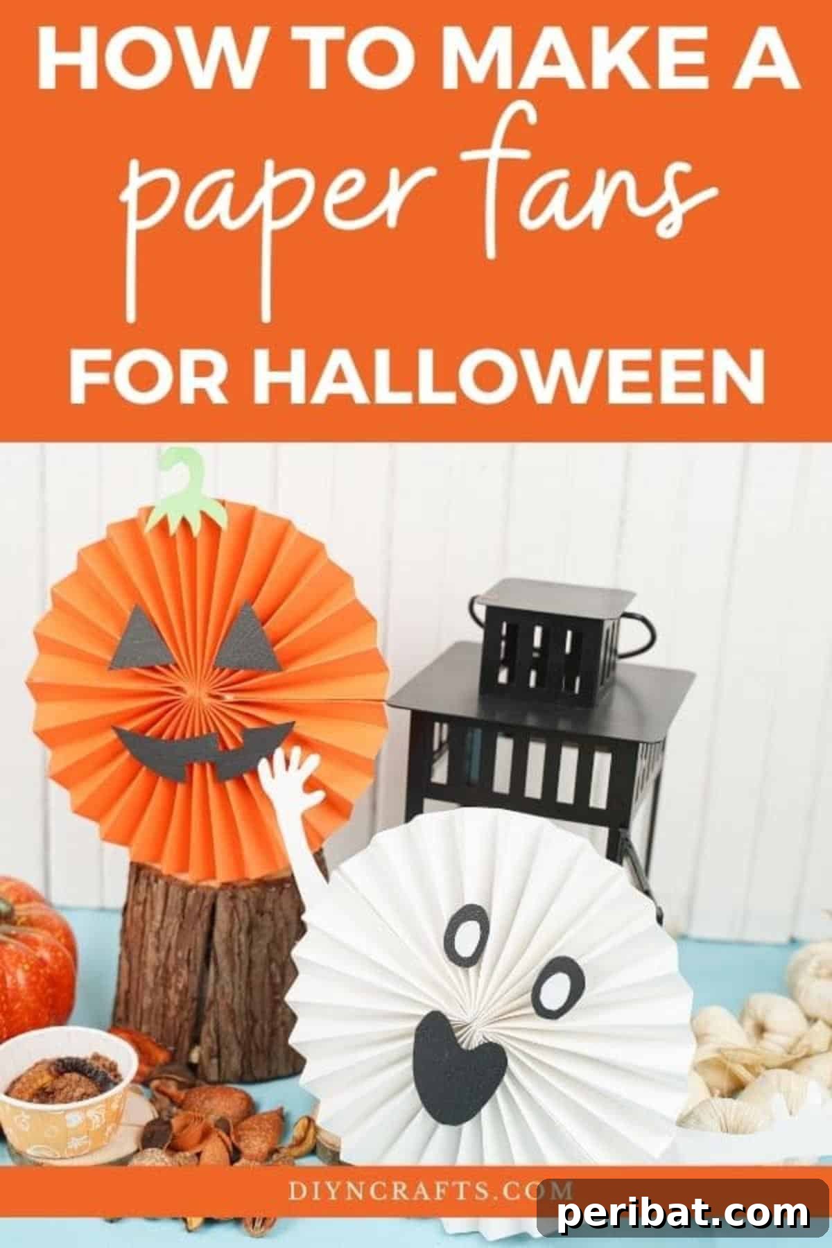 Fun and Easy Halloween Paper Fan Decor 2 Halloween paper fans by black lantern