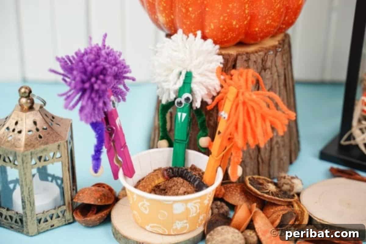 Spooktacular Clothespin Monster Craft 3 Clothespin monsters displayed with Halloween decorations like pumpkins and spiders