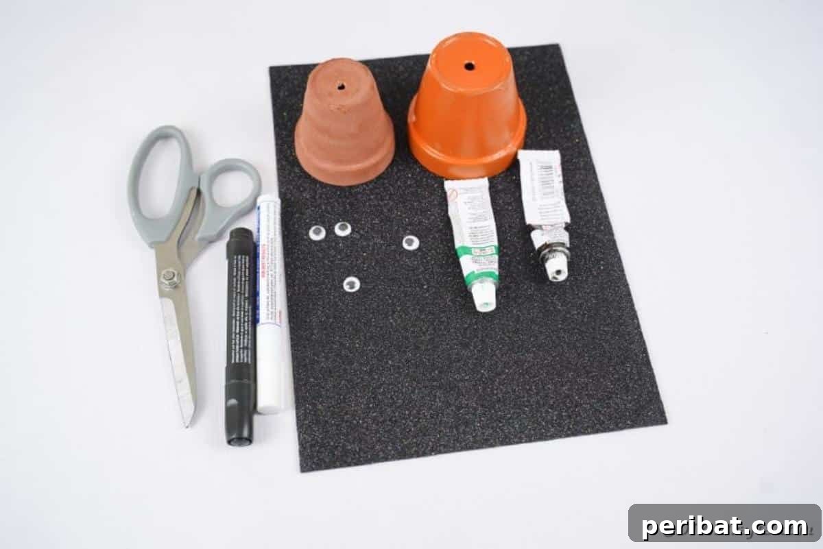 Charming Upcycled Planter Halloween Pals 8 A collection of supplies for making flower pot Halloween characters, including paints, googly eyes, foam paper, and flower pots.