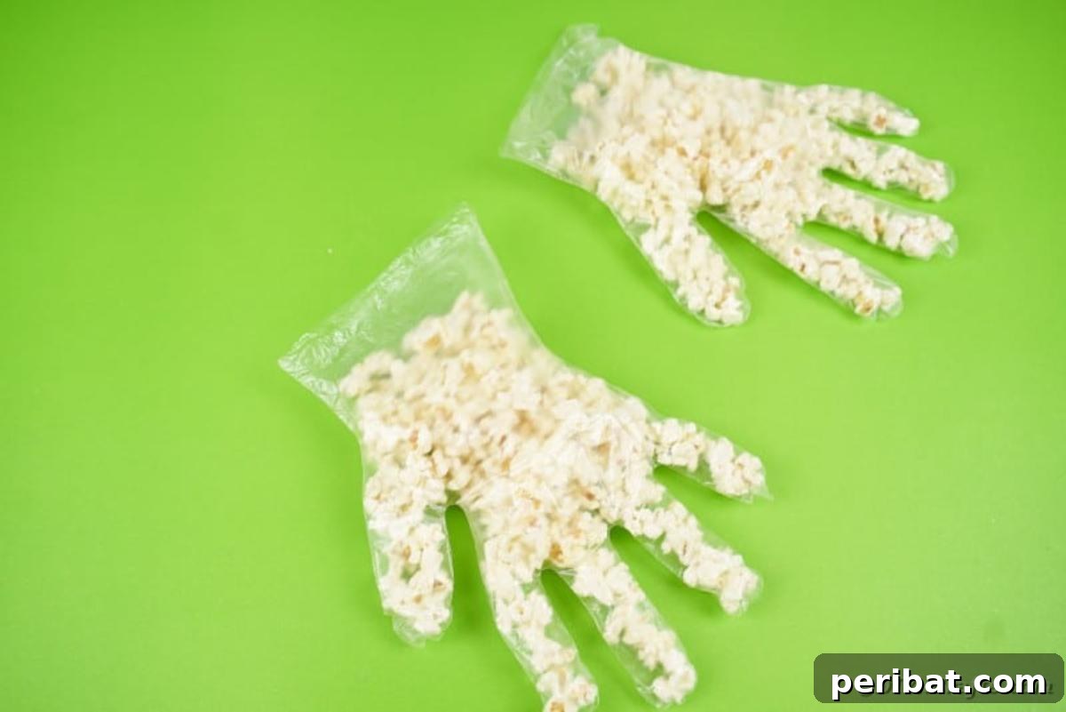 Creepy Popcorn Hand Snacks 11 Two gloves filled with popcorn